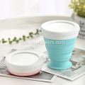 Portable foldable silicone collapsible drinking cup nga adunay taklob